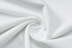 Close-up of white elastic ribbed fabric texture on a tight sleeveless mini dress