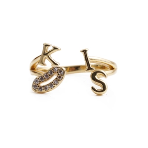 Adjustable gold KISS ring with letter charms and zircon-paved lips symbol