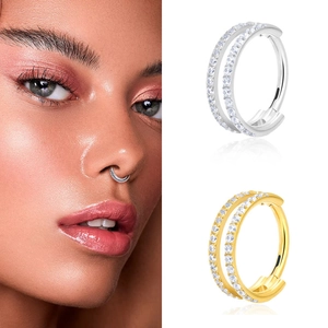 Detailed view of titanium double-layer clicker rings with sparkling zircon inlay for nose