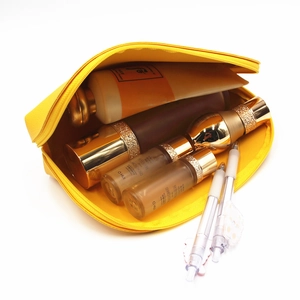 Bright yellow PU leather makeup bag with large capacity shown in a 45-degree angle view
