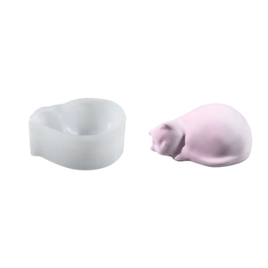 DIY silicone mold for sleeping cat pen holder and a finished pink resin cat figurine