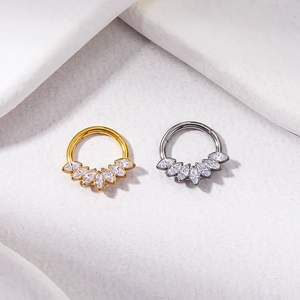 Gold and silver G23 titanium nose rings with marquise cut zircon stones in fan shape
