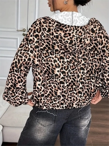 Back view of elegant leopard print hooded cardigan with drawstring and zip closure