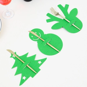 Felt Christmas cutlery holders in reindeer, snowman, and tree shapes with golden forks