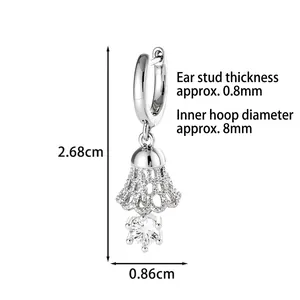 Silver hollow bell pendant hoop earrings with dimensions 2.68cm height and 0.86cm width
