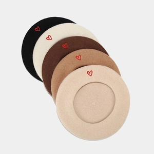 Wool beret for women with red heart embroidery in black beige and brown colors