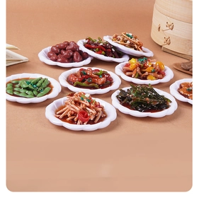 Detailed macro view of 8cm miniature Chinese food models in white lotus petal plates