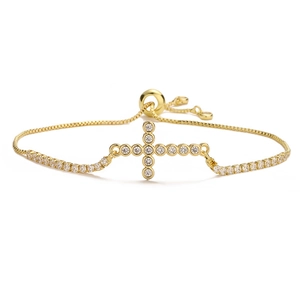 Elegant gold cross bracelet with cubic zirconia stones and adjustable bolo sliding clasp
