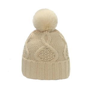 Classic beige knit beanie with large faux fur pompom and textured pattern for autumn winter