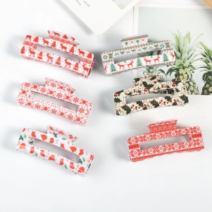 Set of 6 Christmas themed hair claw clips with reindeer, snowflake and festive patterns