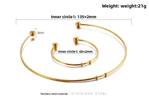 Detail view of 2mm stainless steel collar and bracelet set with 8mm ball accents
