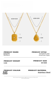 Detail of gold stainless steel starburst necklaces with rectangle and teardrop pendants