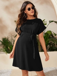 Elegant black crewneck maternity dress with batwing sleeves and adjustable waist tie