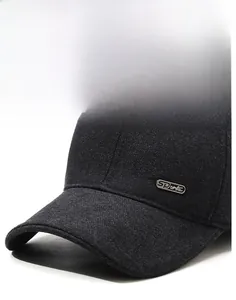 Detail of grey wool baseball cap with Sports metal emblem and textured fabric finish