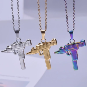 Miniature submachine gun pendant necklaces in silver, gold, and rainbow stainless steel