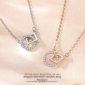 Detail of S925 silver double loop necklace with sparkling zircon pavé on silk