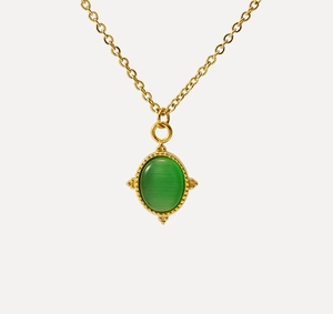 Close-up of vintage sun-style oval green stone pendant with 18K gold plated steel chain