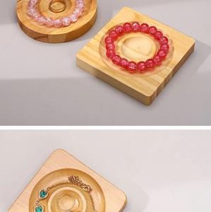 Detailed top view of natural wood round and square trays for jewelry display