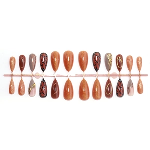 3D butterfly press-on nails set with amber gradient finish and gold foil details