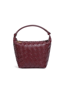 Elegant burgundy woven leather handbag with classic handmade texture and stylish handle