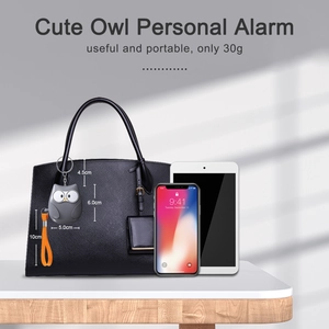 Cute grey owl personal alarm for women attached to a handbag, compact 30g portable size