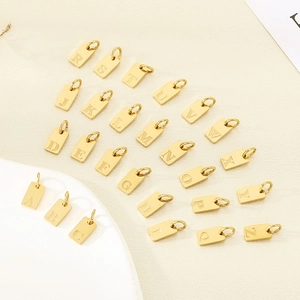 Set of 26 rectangular gold stainless steel alphabet pendants with engraved A-Z letters