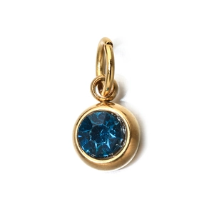 Detail of 6mm gold-plated stainless steel pendant with round blue birthstone for jewelry
