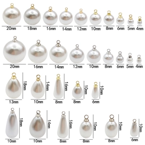 White faux pearl pendants in round and teardrop shapes with gold and silver caps