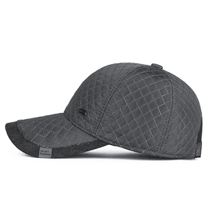 Men's quilted winter baseball cap with earmuffs and windproof fabric for cold weather