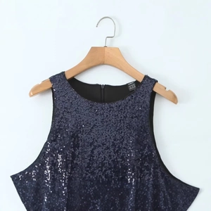Sparkly dark blue sleeveless sequin dress for women featuring a minimalist round neckline
