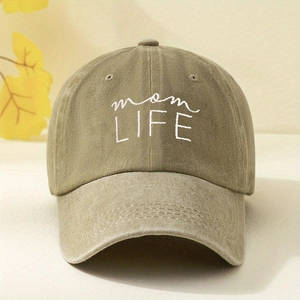 Close-up of mom LIFE white embroidery on vintage khaki green cotton baseball cap
