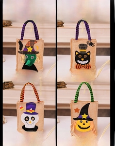 Set of 4 Halloween burlap gift bags featuring witch, black cat, skeleton, and pumpkin designs