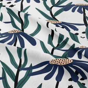 Detailed macro shot of floral fabric texture with navy petals and green leaves