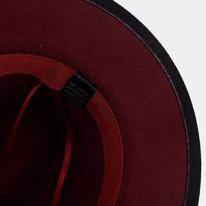 Detail view of cotton-polyester fedora hat interior showing sweatband and care labels