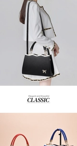 Detail showing the elegant gold bow buckle and lychee grain leather on this luxury handbag