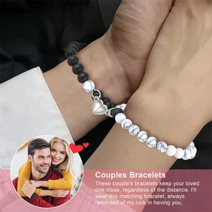 Detail of couple bracelets featuring magnetic heart clasp and frosted stone beads