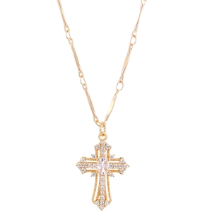 Detailed view of a gold cross pendant necklace with sparkling micro-paved zircons