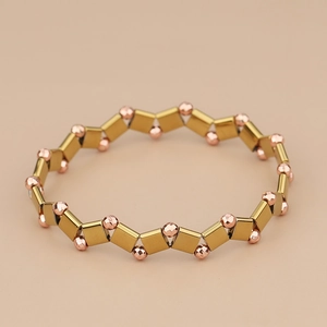 Minimalist Tila bead bracelet with alternating gold square and rose gold faceted beads