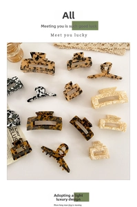 Detailed collection of acetate hair claws featuring tortoiseshell and marble patterns