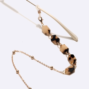 Fashionable tortoise shell acrylic hexagon chain with gold bead metal glasses strap