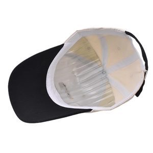 Detail view of the washed cotton baseball cap interior with adjustable metal buckle