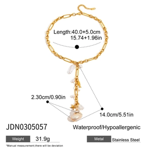 Detail of 18K gold-plated Y-necklace with pearls, starfish and shell ocean charms
