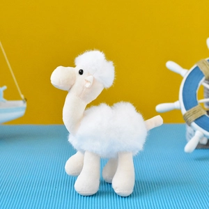 Soft white plush camel keychain toy with fluffy texture and cute design