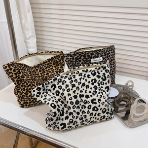 Three-piece leopard print canvas makeup bags in brown, dark coffee and off-white colors