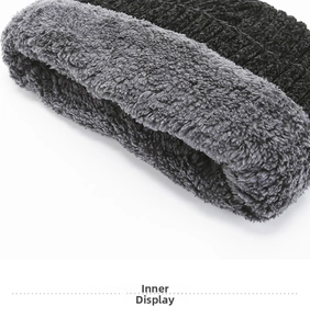 Detailed close-up showing the warm grey fleece lining and black knit of the winter hat
