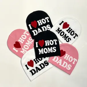 Knit beanie set with I Heart Hot Moms Dads jacquard in black, white and pink colors