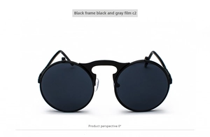 Detail view of retro steampunk flip-up sunglasses with black round metal frame and grey lenses