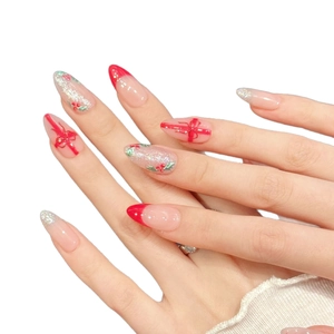 Christmas wreath press-on nails in almond shape with red ribbons and silver glitter