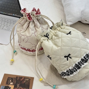 Quilted drawstring pouch set with bunny print and bow embroidery for travel storage