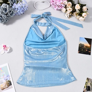 Detailed flat lay of light blue halter top with metallic luster and ribbed texture